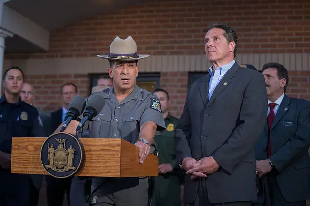 Soon-to-be-former State Police Superintendent Joseph D'Amico and Governor Andrew Cuomo
